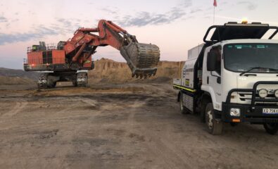 construction-heavy-equipment-backhoe-and-dumptruck